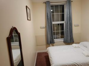 Postel nebo postele na pokoji v ubytování Alma Villa + 3 fotografie