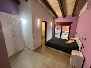 Postel nebo postele na pokoji v ubytování B&B House