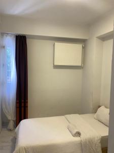 Postel nebo postele na pokoji v ubytování HOTEL YEDİkapı