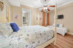 Ένα ή περισσότερα κρεβάτια σε δωμάτιο στο Carillon Sunset 101 +91 φωτογραφίες