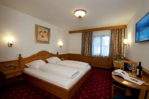 Postel nebo postele na pokoji v ubytování Hotel Bierwirt