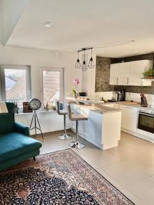 Kuchyň nebo kuchyňský kout v ubytování La Dolce Vita Apartment