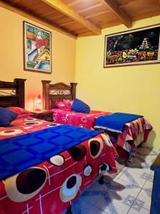 Letto o letti in una camera di Hotel Casa Tecpán