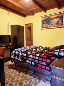 Letto o letti in una camera di Hotel Casa Tecpán