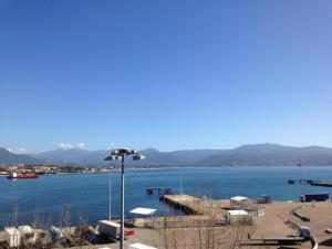 a view of a body of water with a dock at Hotel le Dauphin in Ajaccio