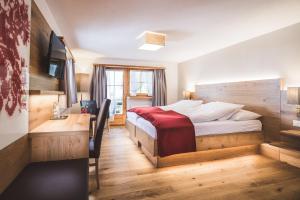Postel nebo postele na pokoji v ubytování Collina Bed and Breakfast Lenzerheide
