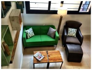 A seating area at Casas Apartamentos Gracia
