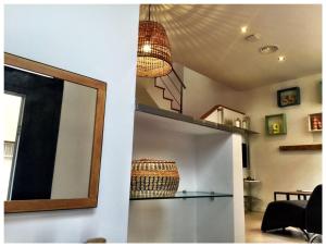 A kitchen or kitchenette at Casas Apartamentos Gracia