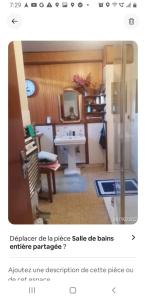a bathroom with a sink and a mirror at Chambre au calme sur les collines in Nice