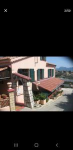 two pictures of a house with a roof at Chambre au calme sur les collines in Nice