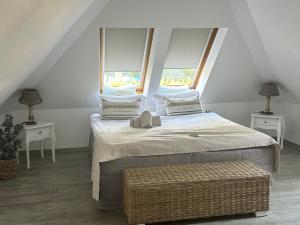 Ένα ή περισσότερα κρεβάτια σε δωμάτιο στο Landhaus Chica