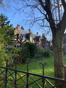 a fence in front of a house at LeLou in Utrecht +5 photos