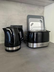 Køkken eller tekøkken på Zona 57 Apartamenty Okuninka