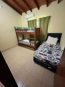 Postel nebo postele na pokoji v ubytování Casa Victoria
