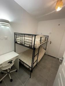 Ένα ή περισσότερα κρεβάτια σε δωμάτιο στο Appartement T2 +2 φωτογραφίες