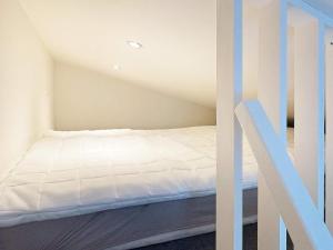 Llit o llits en una habitació de 3 person holiday home in Sölvesborg-By Traum