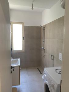 Phòng tắm tại Genti Apartament