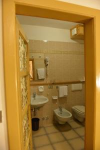 Kúpeľňa v ubytovaní Hotel Gufo