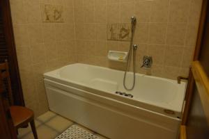 Kúpeľňa v ubytovaní Hotel Gufo