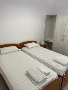 Postel nebo postele na pokoji v ubytování NAFSIKA Apartments