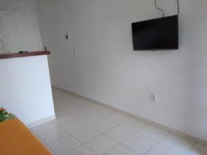 Μια τηλεόραση ή/και κέντρο ψυχαγωγίας στο Flat's Morada das Palmeiras