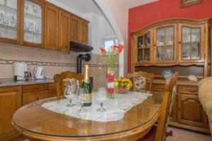 Kuchyň nebo kuchyňský kout v ubytování Apartments Mari + 21 fotografií