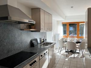 Køkken eller tekøkken på Grand Apartment mit Titisee-Blick - Villa Hubertus