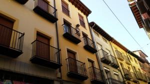 a building with balconies on the side of it at Apartamento Gure Ganbara in Estella