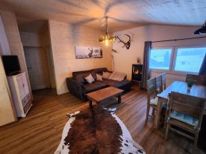 Posezení v ubytování Alpenhaus Flügelbeck - Selbstversorgung