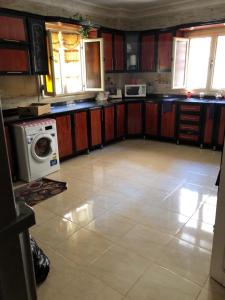 Kuchyň nebo kuchyňský kout v ubytování Duplex 5BD 3BR