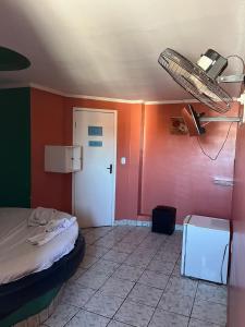 Postel nebo postele na pokoji v ubytování Hotel Paradise