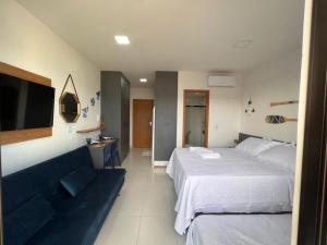 Postel nebo postele na pokoji v ubytování Mana Beach na Praia de Muro Alto Porto de Galinhas a 300 metros da Praia + 18 fotografií