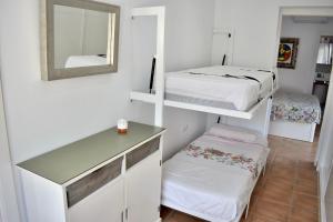 Postel nebo postele na pokoji v ubytování El Rincon de Piedra - Tu Hogar En Vacaciones