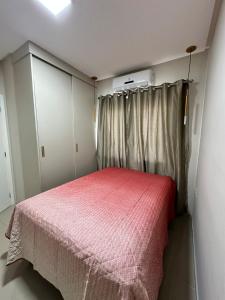 Katil atau katil-katil dalam bilik di Apartamento São Luís Araçagy Lado Praia +4 gambar