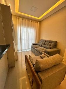 Ruang duduk di Apartamento São Luís Araçagy Lado Praia