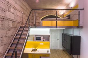 A kitchen or kitchenette at Hollo apartment