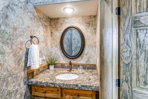 a bathroom with a sink and a mirror at Spacious Afton Home Patio, Grill and Mountain Views in Afton +22 photos