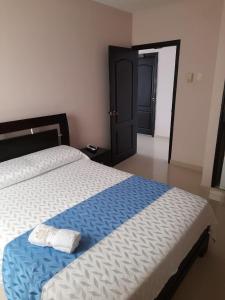Postel nebo postele na pokoji v ubytování Hotel Dainner