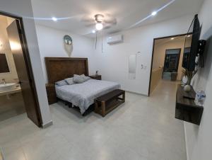 Postel nebo postele na pokoji v ubytování Residencia en Mérida, Yucatán