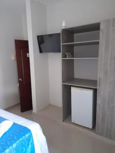 TV a/nebo společenská místnost v ubytování Hotel Dainner
