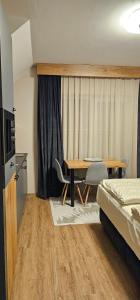 Postel nebo postele na pokoji v ubytování Apartmány Špacír 3