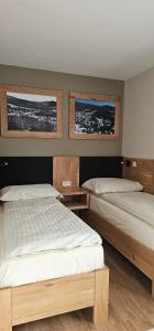 Postel nebo postele na pokoji v ubytování Apartmány Špacír 3