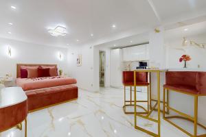 Postel nebo postele na pokoji v ubytování Suite romantique avec jacuzzi