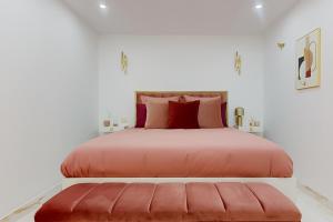 Postel nebo postele na pokoji v ubytování Suite romantique avec jacuzzi