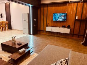 Μια τηλεόραση ή/και κέντρο ψυχαγωγίας στο Prestige Home apartment