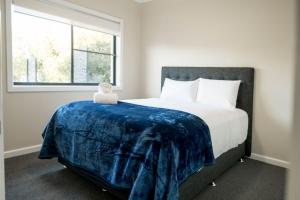 Ένα ή περισσότερα κρεβάτια σε δωμάτιο στο Bellevue Holiday House +18 φωτογραφίες