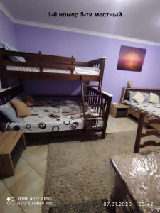 Postel nebo postele na pokoji v ubytování Romana Hotel