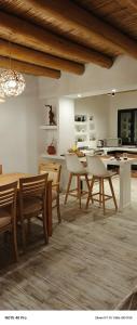 a kitchen and dining room with a table and chairs at Entre Cerros in Maimará