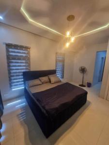 Postel nebo postele na pokoji v ubytování Stren Mulberry Apartments