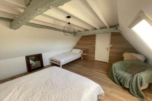 Postel nebo postele na pokoji v ubytování Warm cottage in Corrèze-formerly TUI Ferienhaus